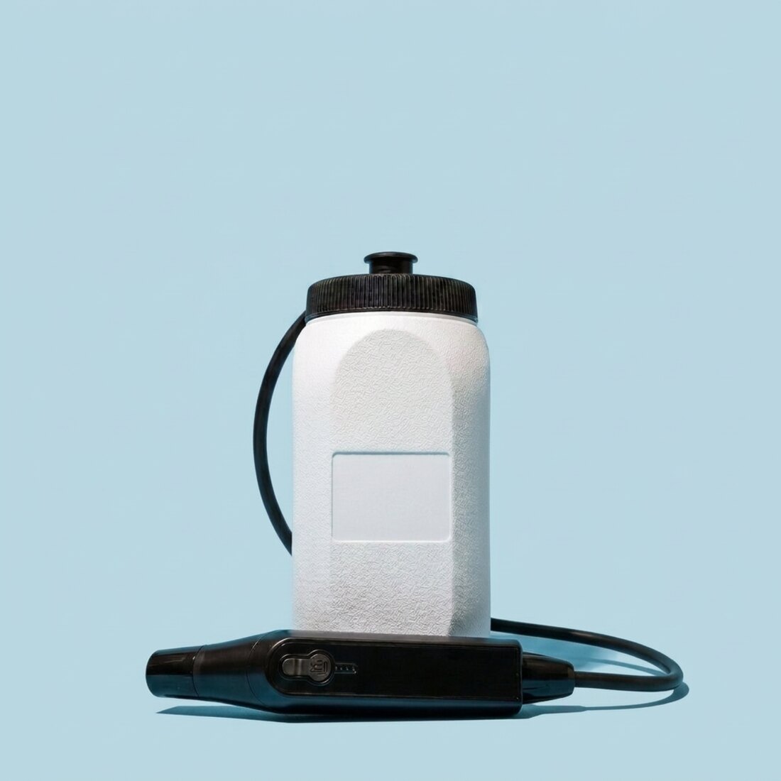 RinseFlow portable bidet water tank and spray handle — no plumbing installation required